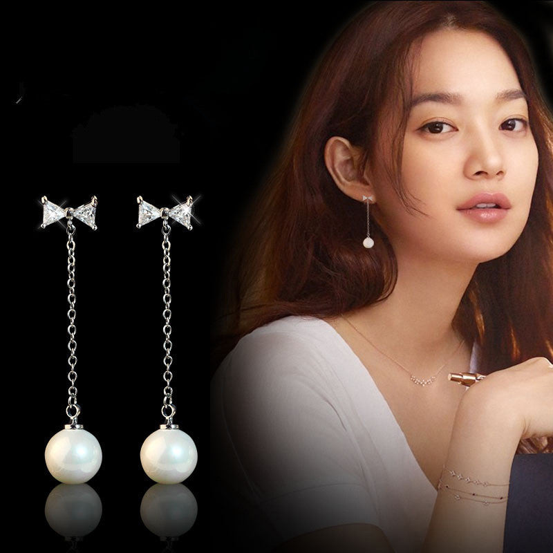 Luminous Whispers: 925 Sterling Silver Bow & Pearl