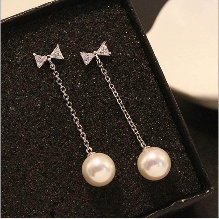 Luminous Whispers: 925 Sterling Silver Bow & Pearl