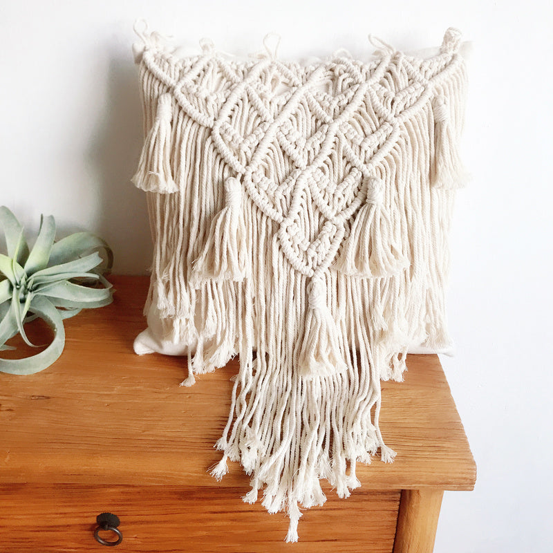 Coussin à pompons tissé à la main Luxora