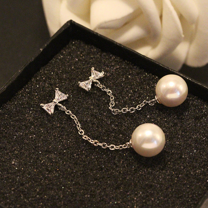 Luminous Whispers: 925 Sterling Silver Bow & Pearl