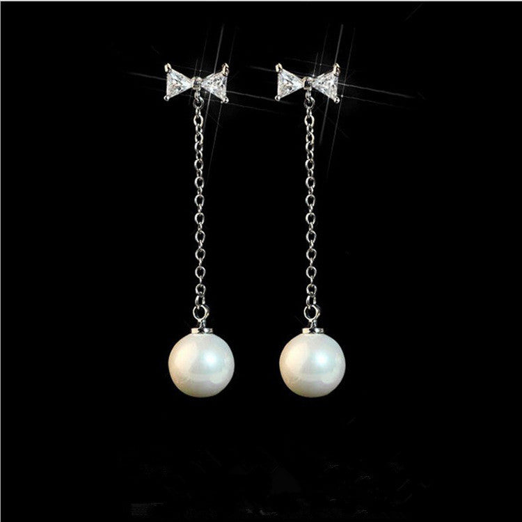 Luminous Whispers: 925 Sterling Silver Bow & Pearl