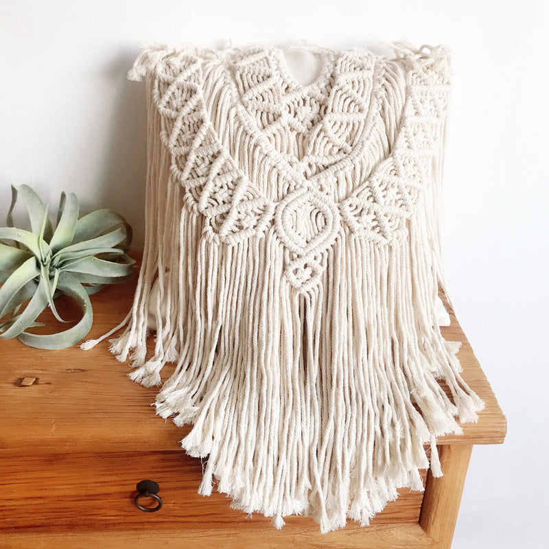 Coussin à pompons tissé à la main Luxora